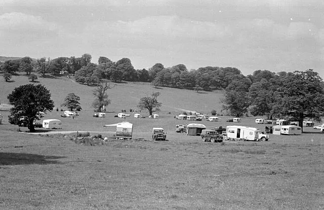 Caravans and Land Rovers camped at Eastnor